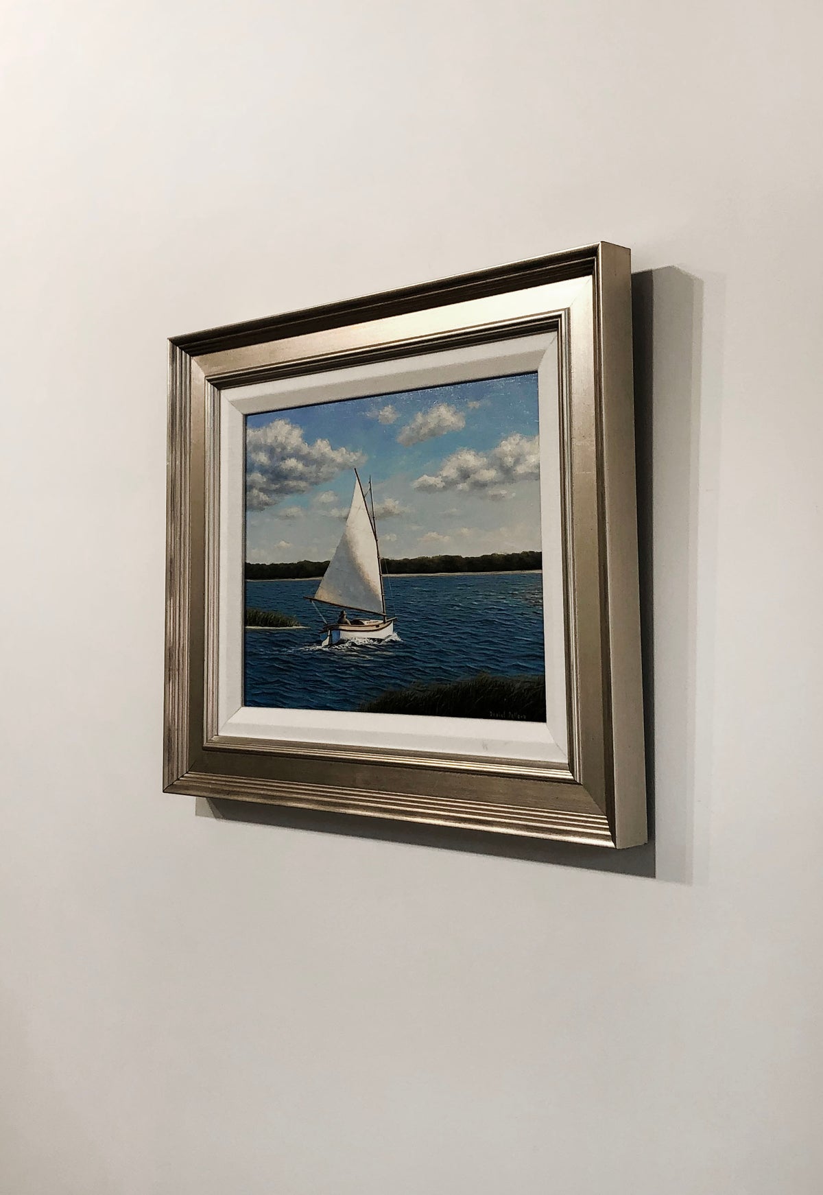A left side-image of a painting of a  sailboat.