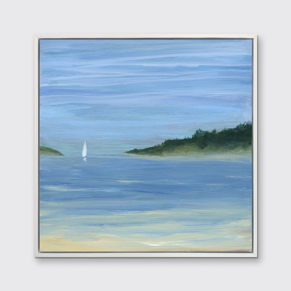 A blue, green and white abstract seascape print with a small sailboat in a white floater frame hangs on a white wall.