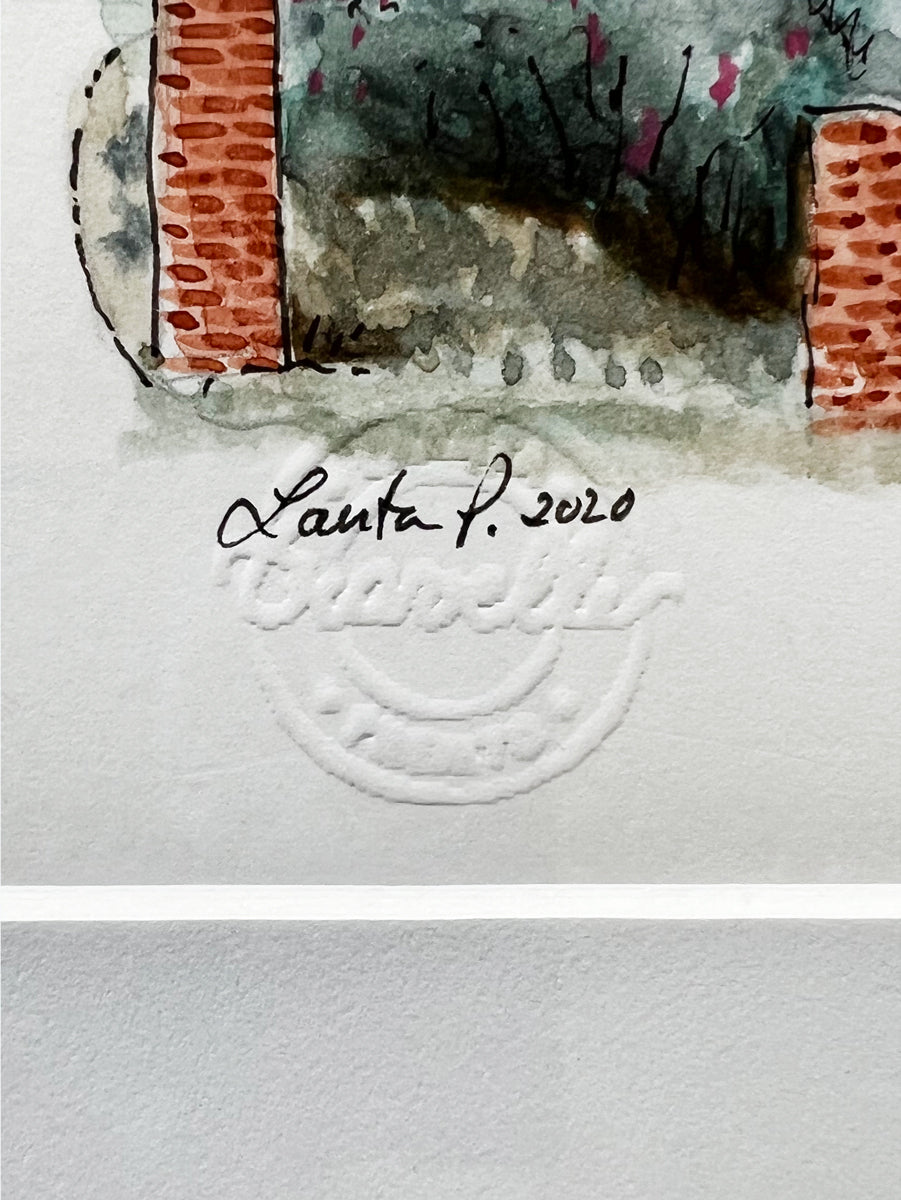 A close up view of the artist's signature and stamp.