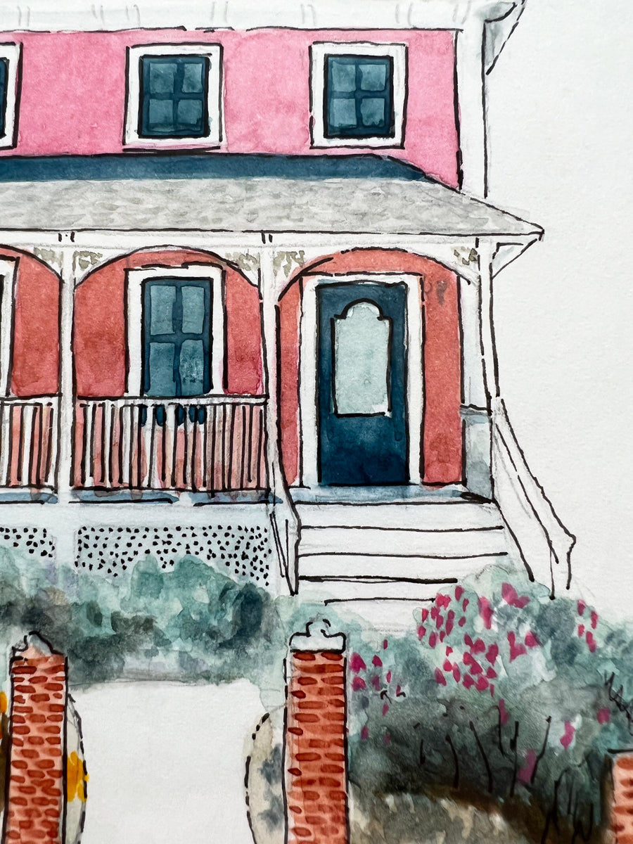 A close up view of the house's front door, front porch and entrance.