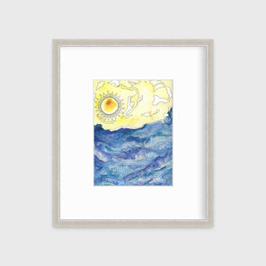A blue and yellow illustration seascape print in a silver frame with a mat hangs on a white wall.