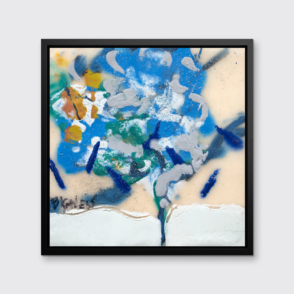 A blue, white, green and orange abstract print in a black floater frame hangs on a white wall.
