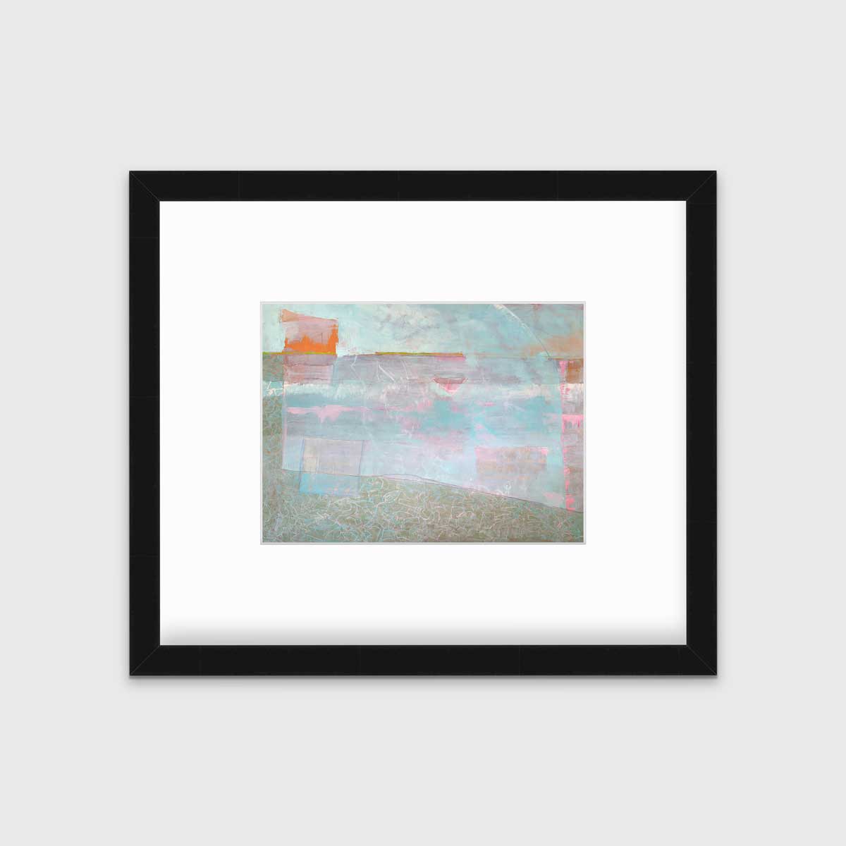 A light blue and pink abstract print by Christine Averill-Green in a black frame with a mat hangs on a white wall.