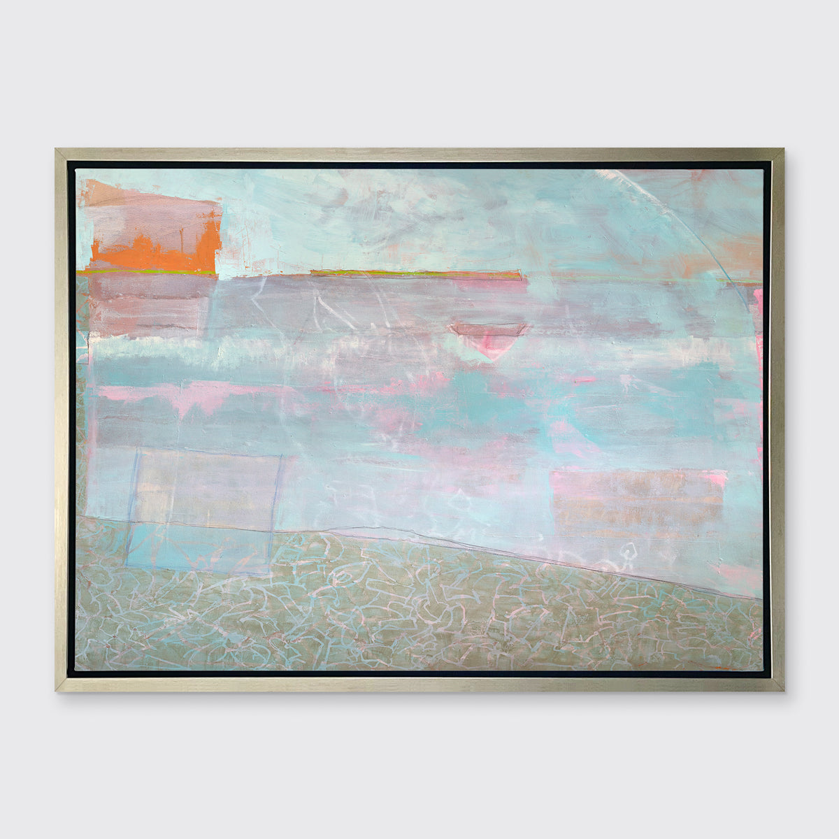 A light blue and pink abstract print in a silver floater frame hangs on a white wall.
