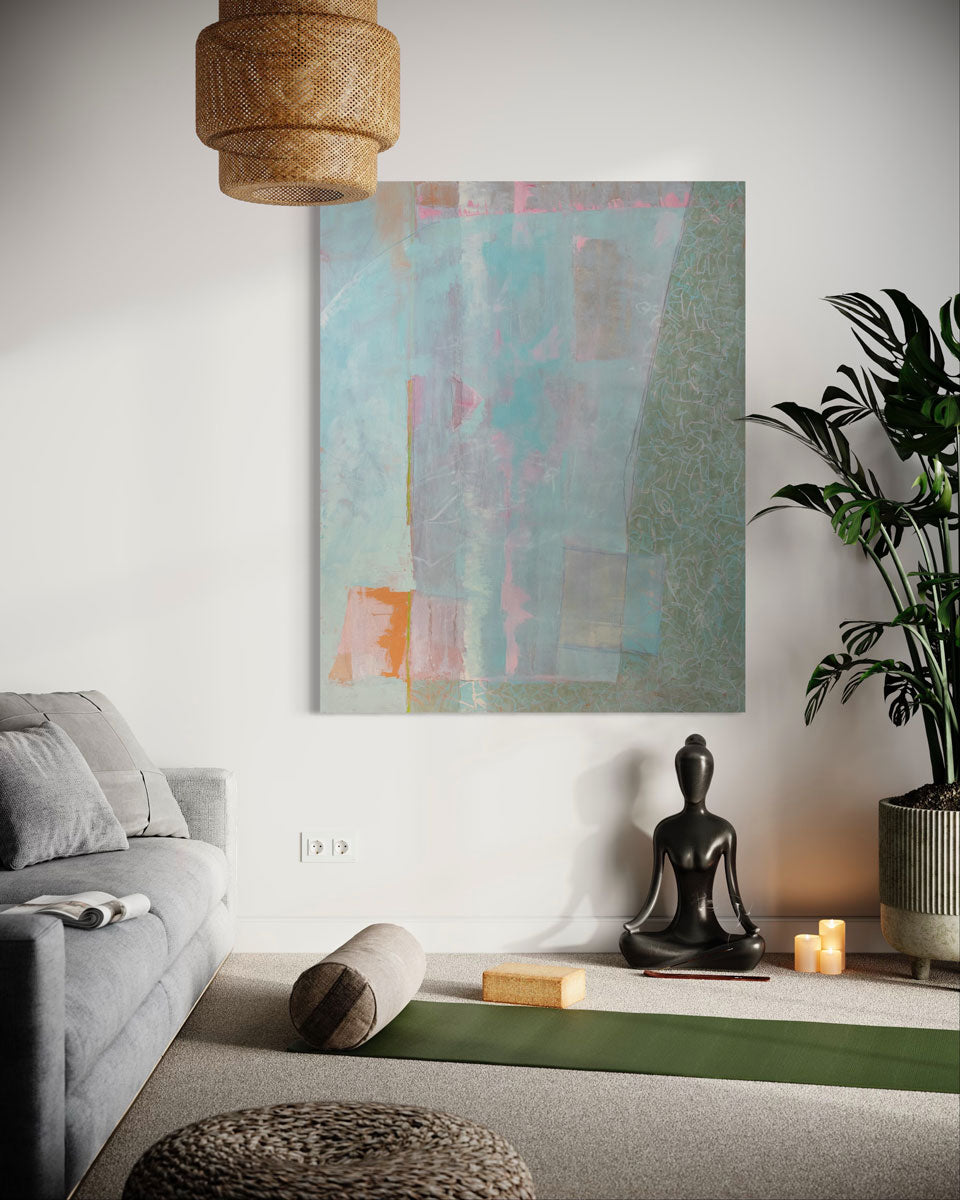 An abstract painting by Christine Averill-Green is hung vertically in a living room with a buddha sculpture.