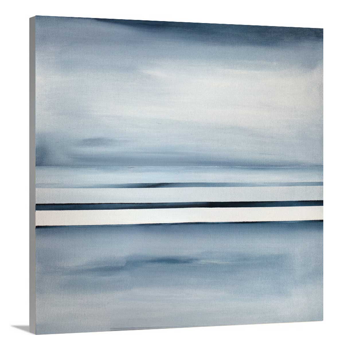 Side angle view of a blue and white linear abstract landscape print on canvas.