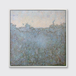 A light blue abstract landscape print in a white floater frame hangs on a white wall.