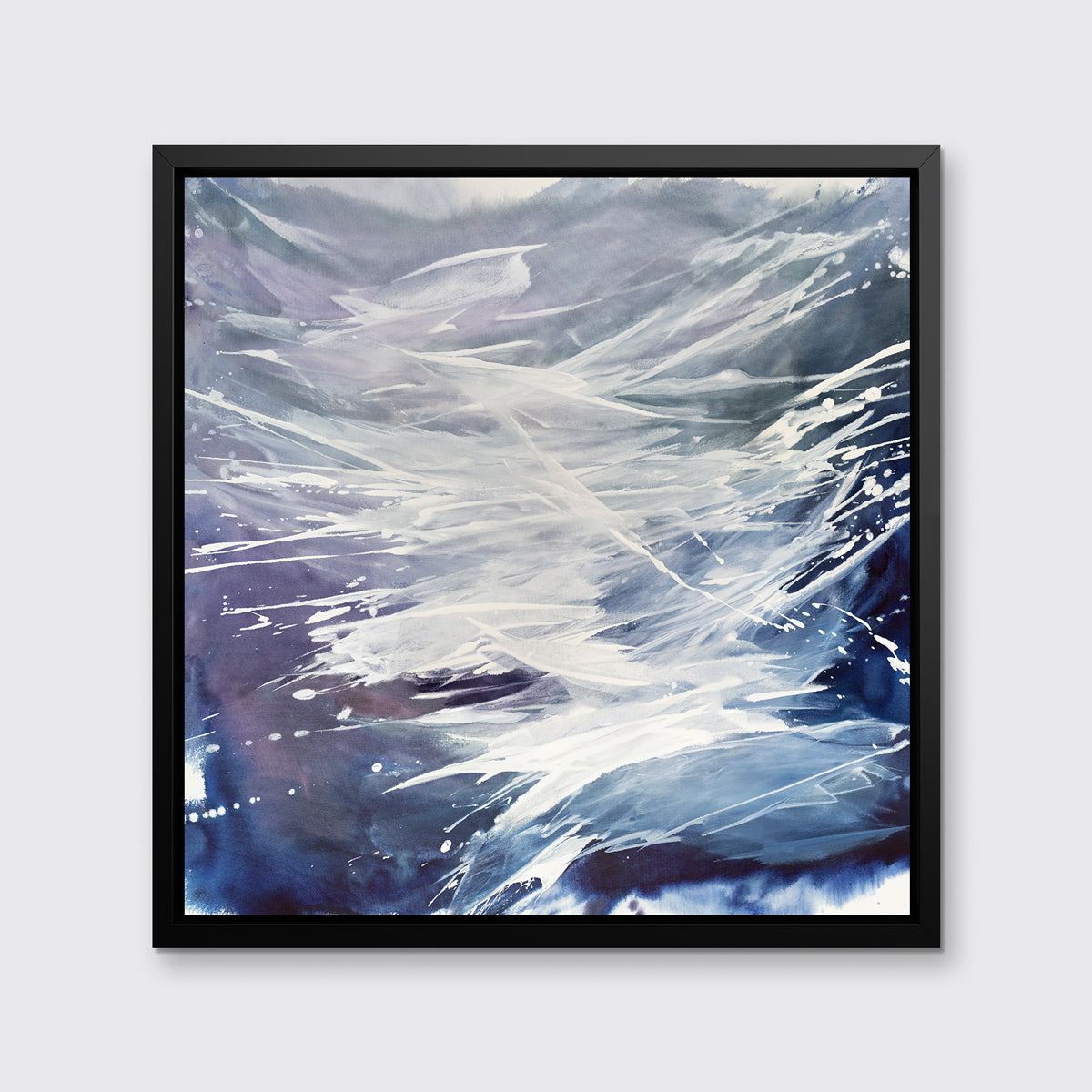 A purple, grey, white and blue abstract print in a black floater frame hangs on a white wall.