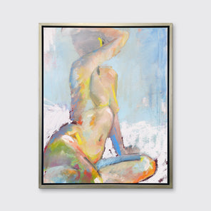 A multicolored abstract figural print in a silver floater frame hangs on a white wall.