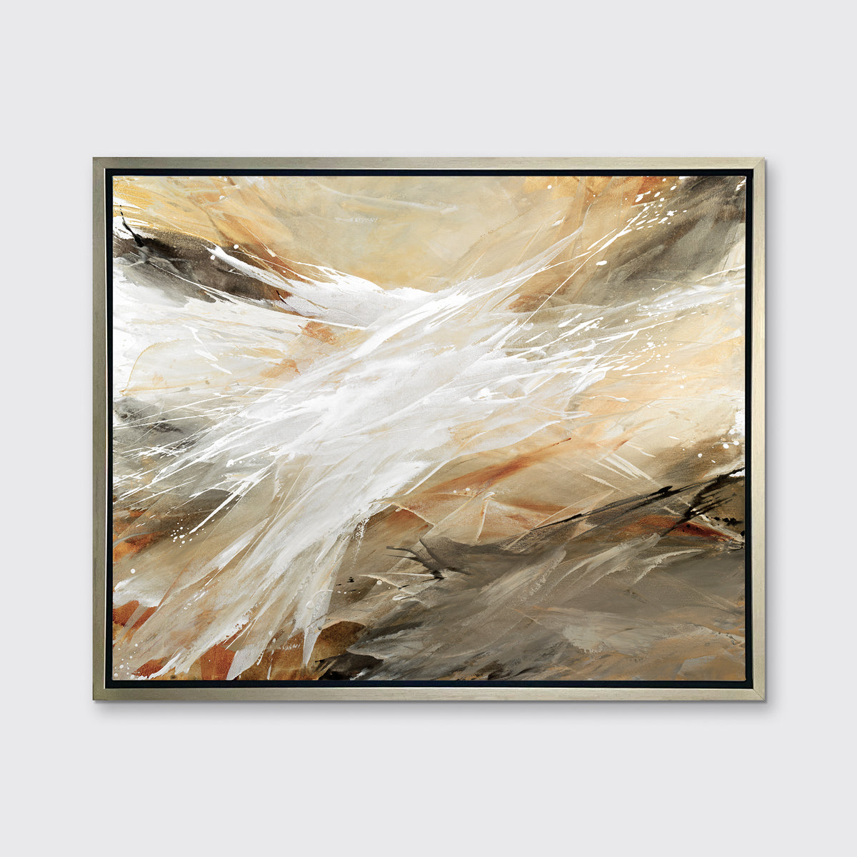 A beige, grey, white and black abstract print in a silver floater frame hangs on a white wall.