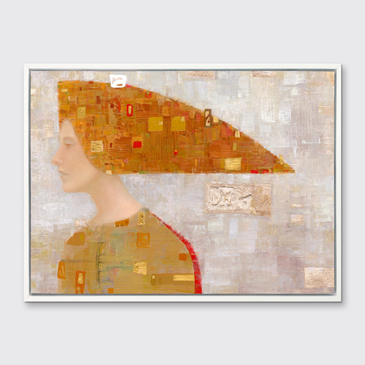 A print of an abstract portrait of a woman in profile wearing a long orange and gold, triangular head piece in a white floater frame hangs on a white wall.