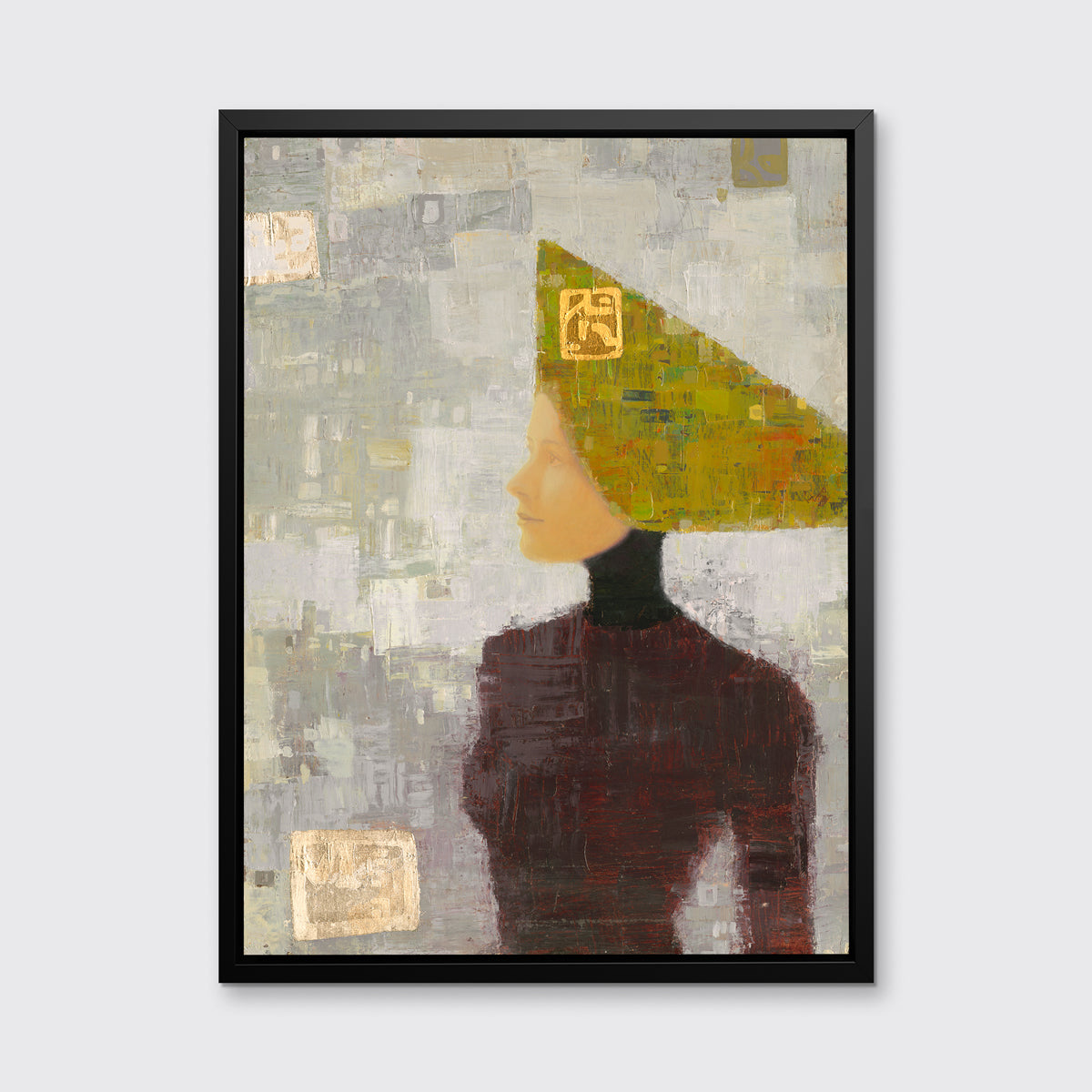A grey, olive green and dark red abstract print of a woman with a headpiece in a black floater frame hangs on a white wall.