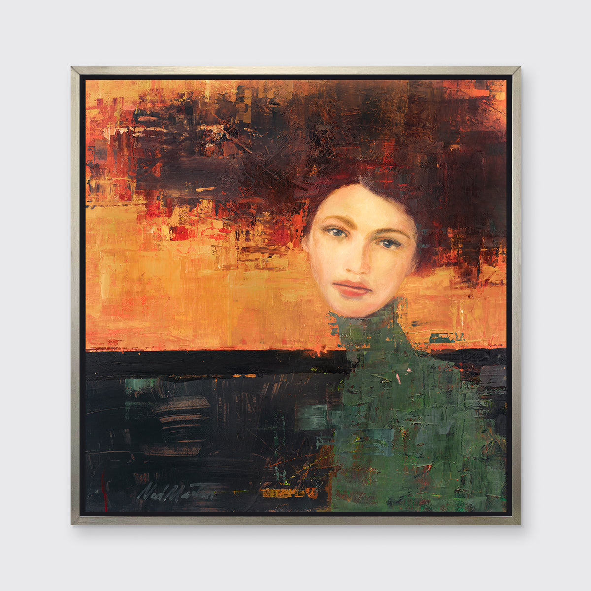 A orange, red, green and black abstract figural print in a silver floater frame hangs on a white wall.