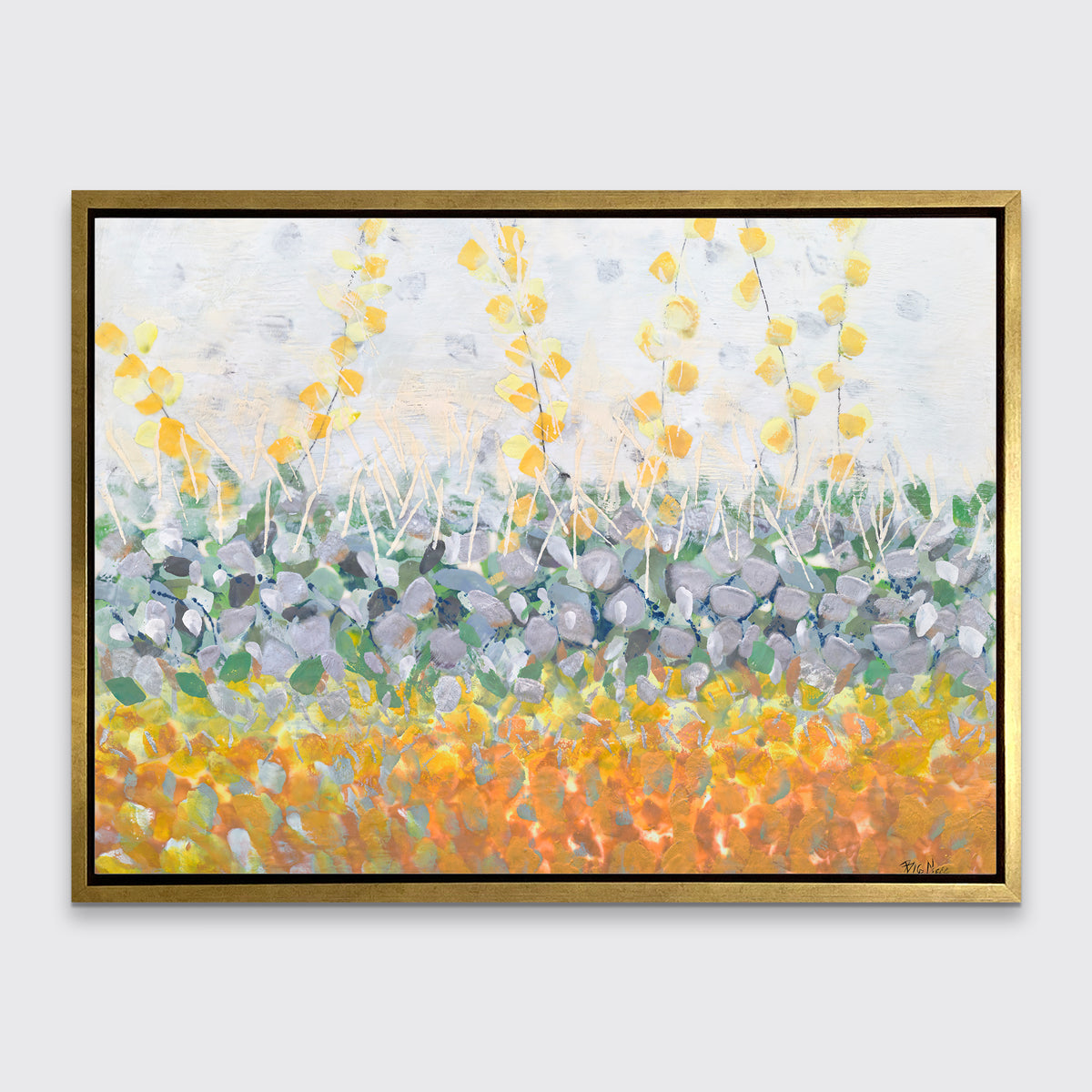 A yellow, purple, green and orange abstract print in a gold floater frame hangs on a white wall.