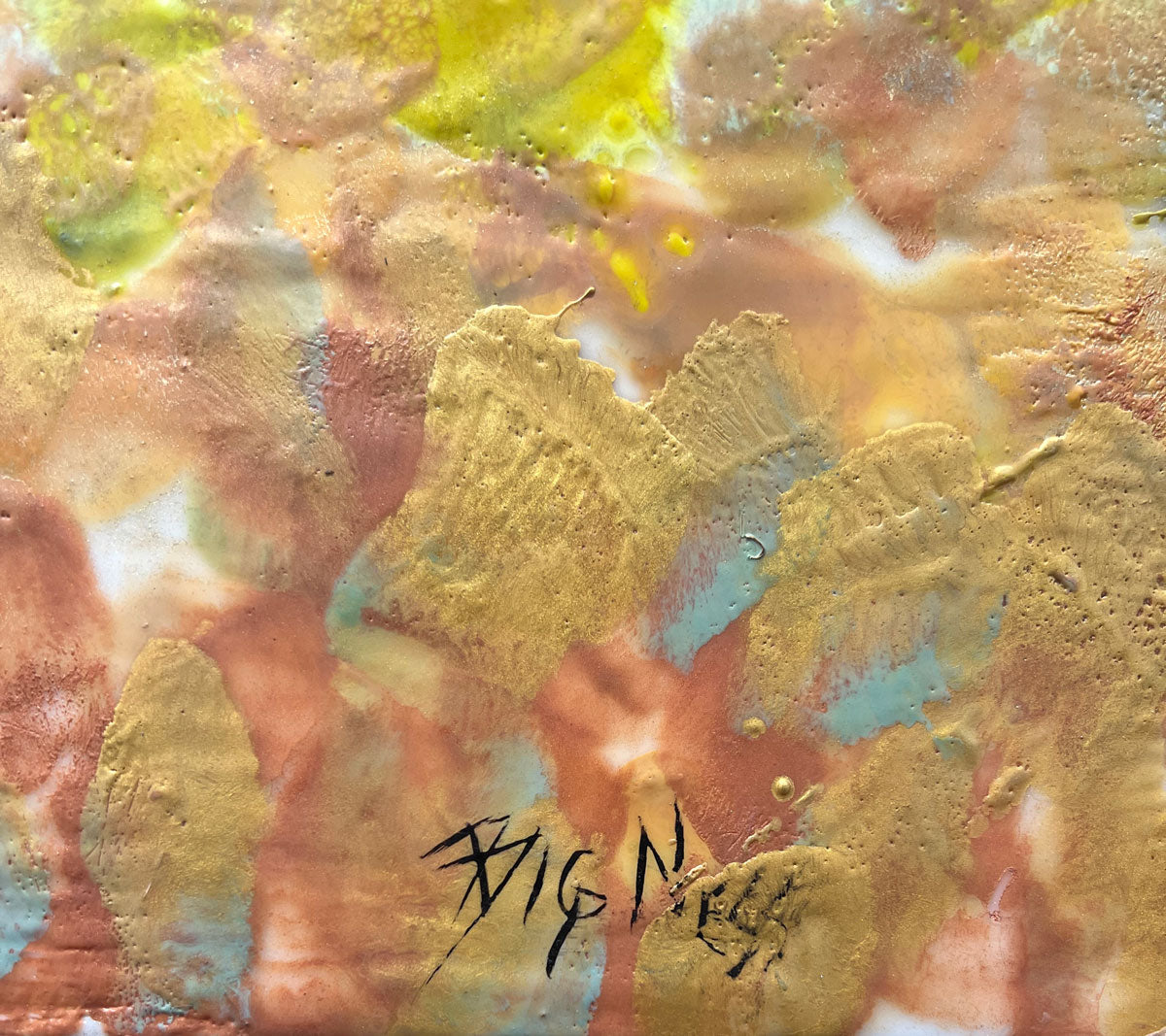 A detail shot of the signature of the artist, Linda Bigness.