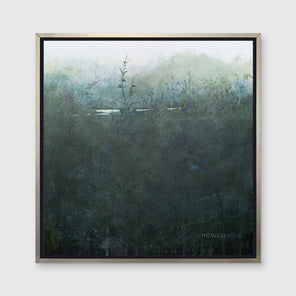 A dark muted teal abstract landscape print in a silver floater frame hangs on a white wall.