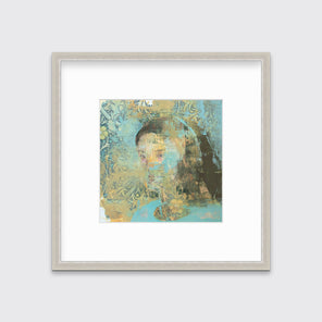 A light blue, beige and brown abstract figural print in a silver frame with a mat hangs on a white wall.