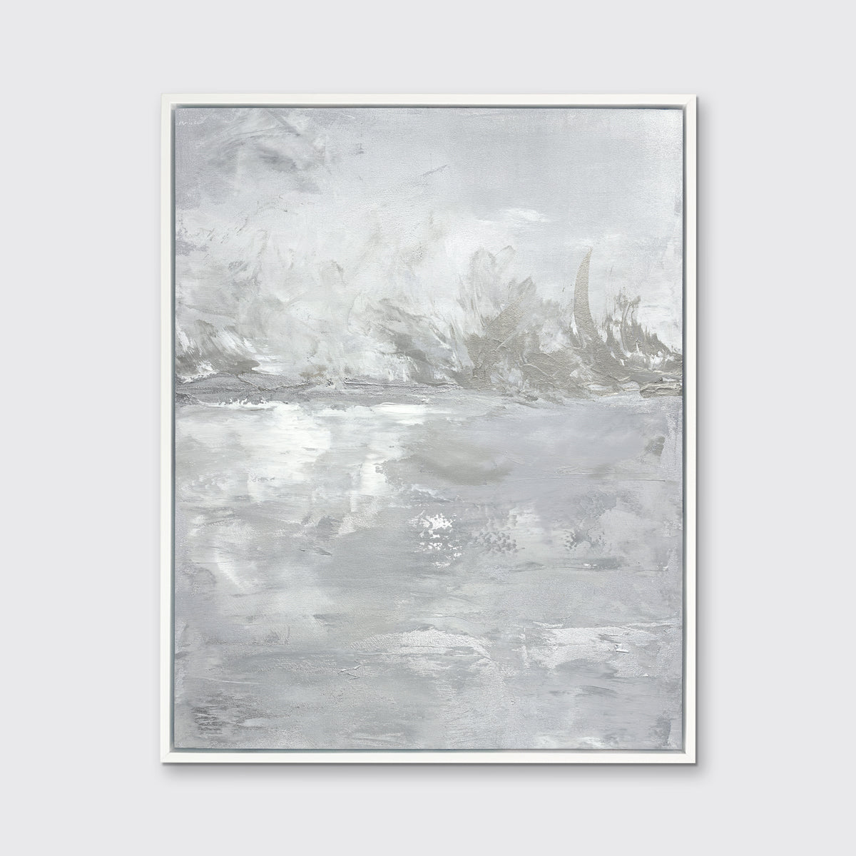 A grey and white abstract print by Julia Contacessi in a white floater frame hangs on a white wall.