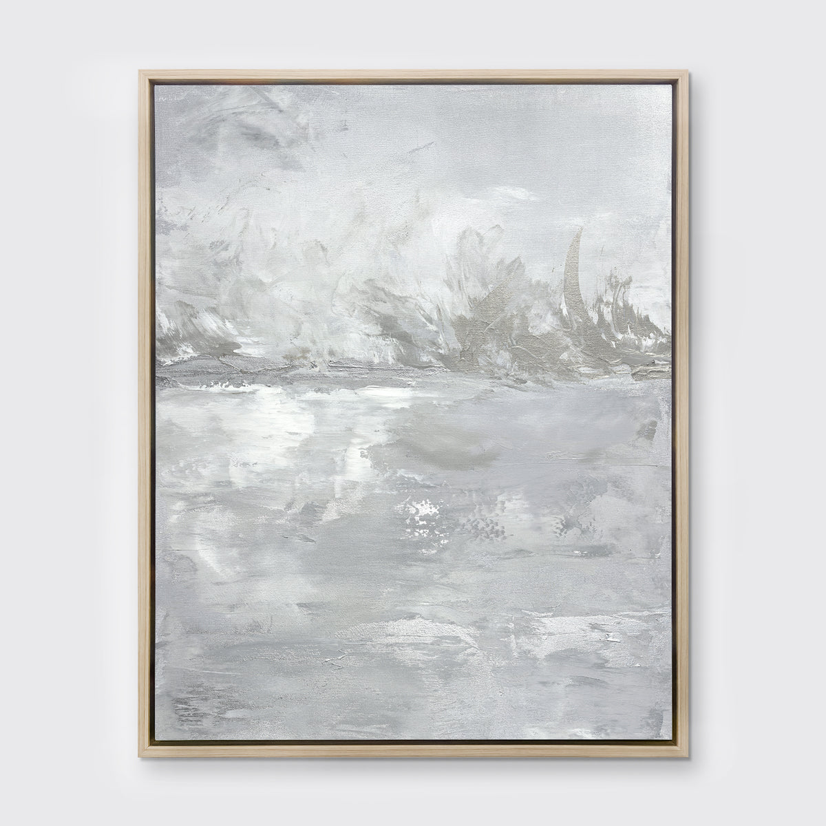 A grey and white abstract print by Julia Contacessi in a white oak wood floater frame hangs on a white wall.