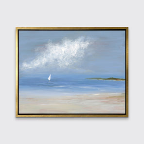 A blue, beige and white abstract seascape print with a small sailboat in a gold frame hangs on a white wall.