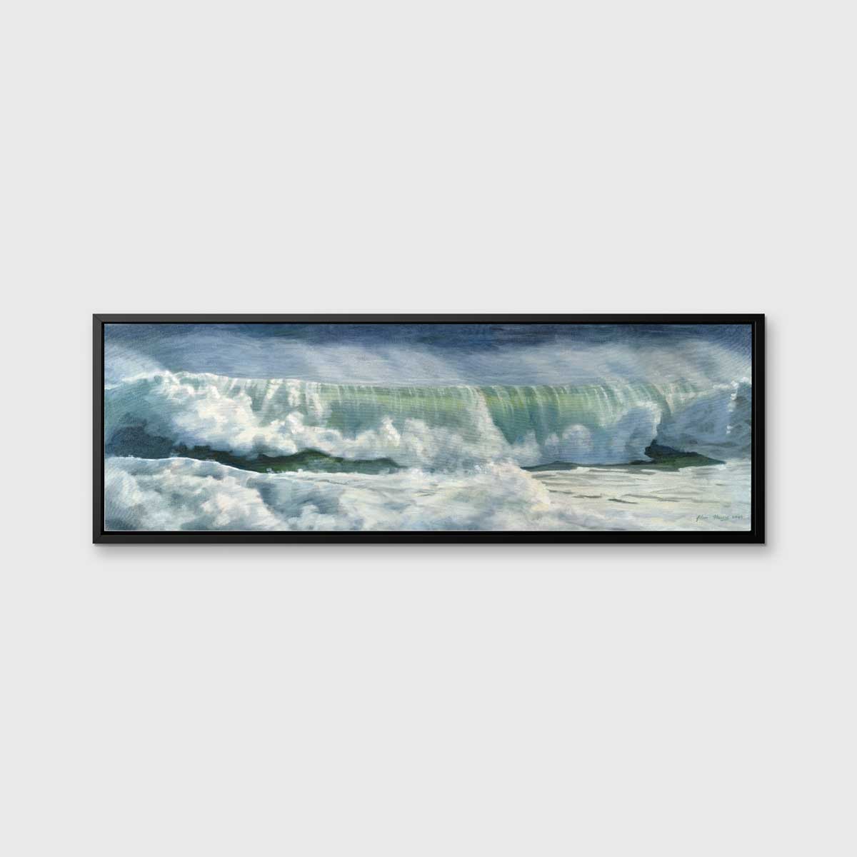 A blue, white and green abstract rolling wave coming to shore print in a black floater frame hangs on a white wall.