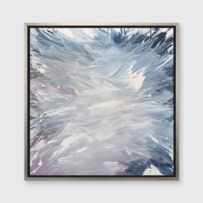 A light purple, grey, white and blue abstract print in a silver floater frame hangs on a white wall.