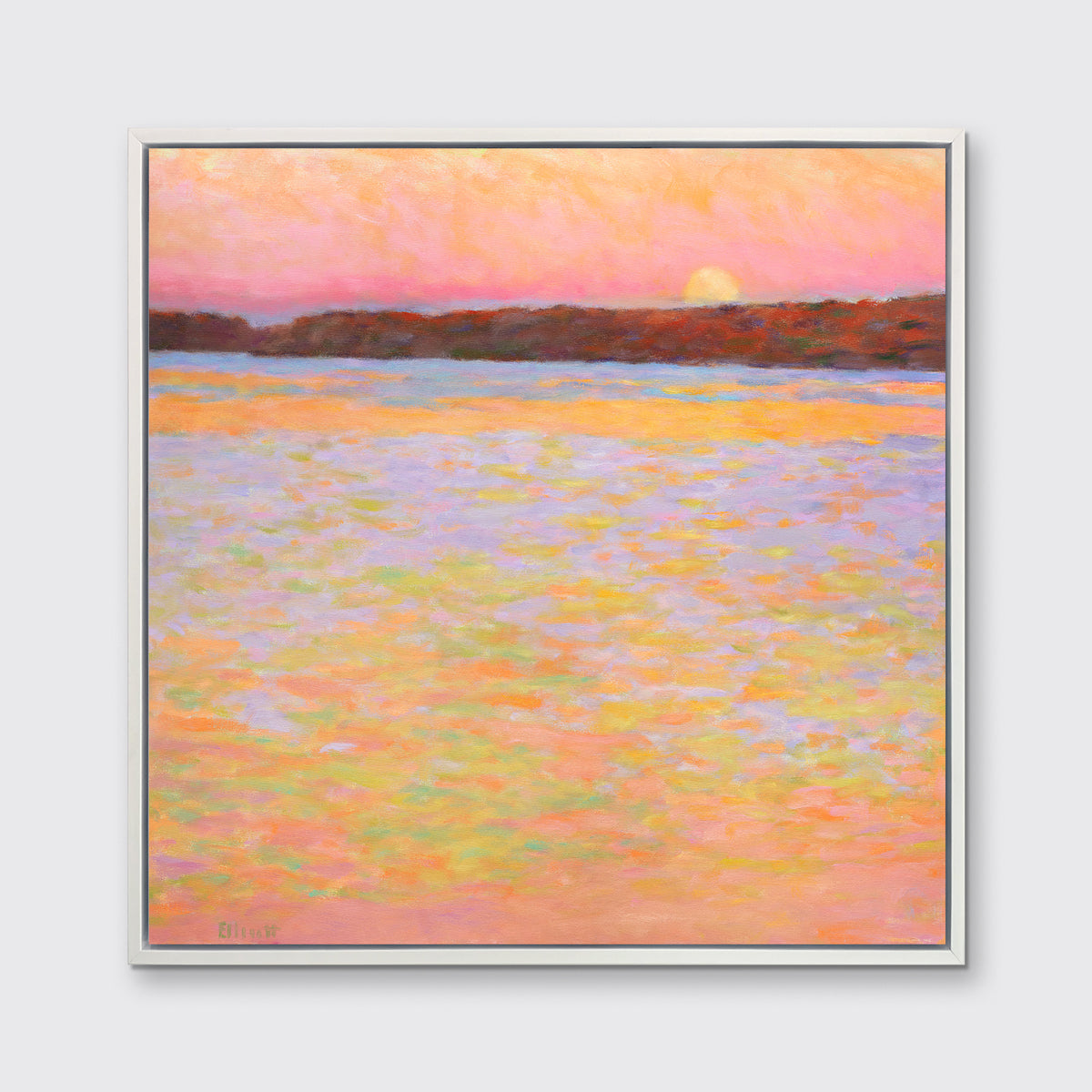 A pink, orange, lavender and red impressionist landscape print in a white floater frame hangs on a white wall.