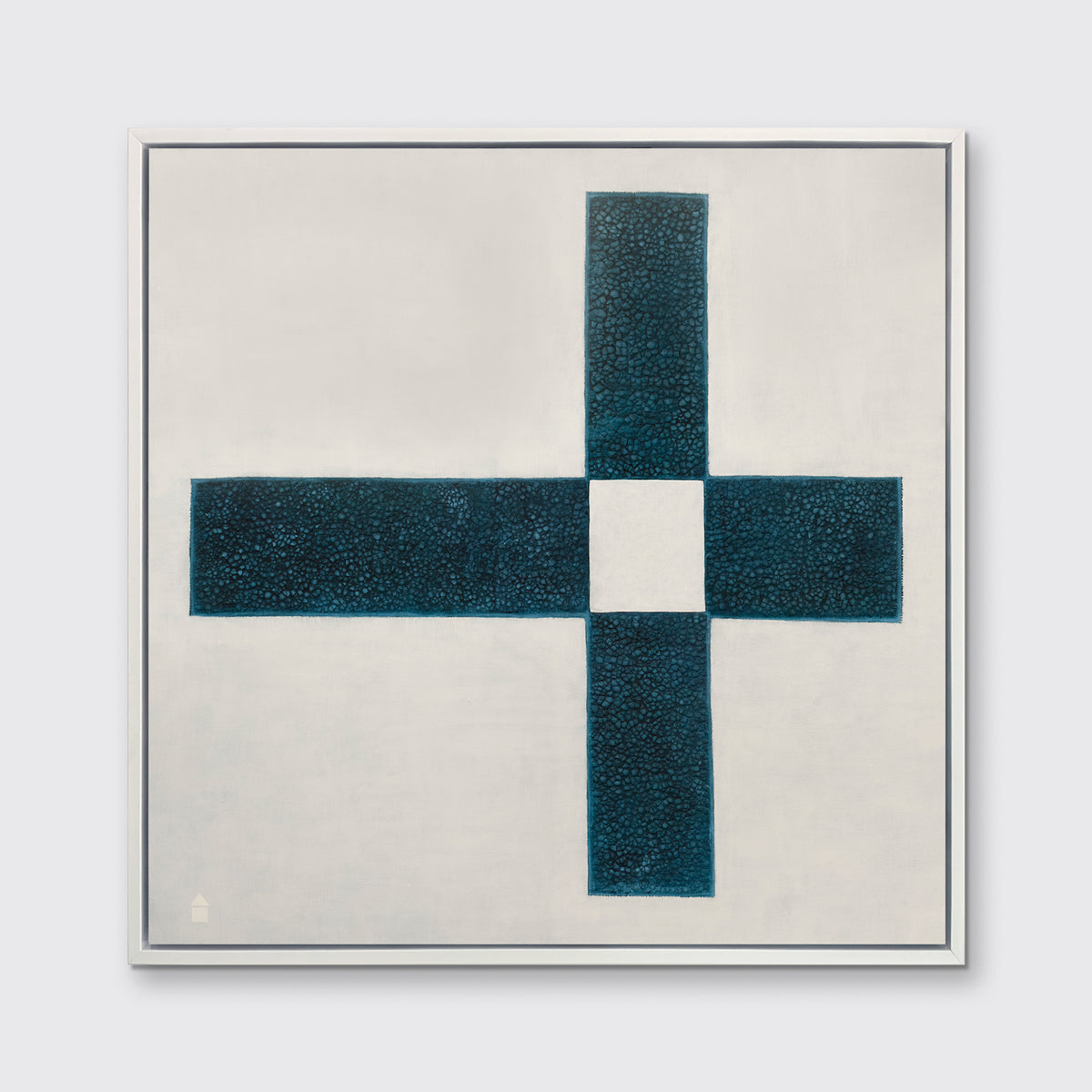 A beige and teal abstract geometric print in a white floater frame hangs on a white wall.