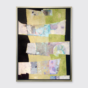 A green, black and beige abstract print in a silver floater frame hangs on a white wall.