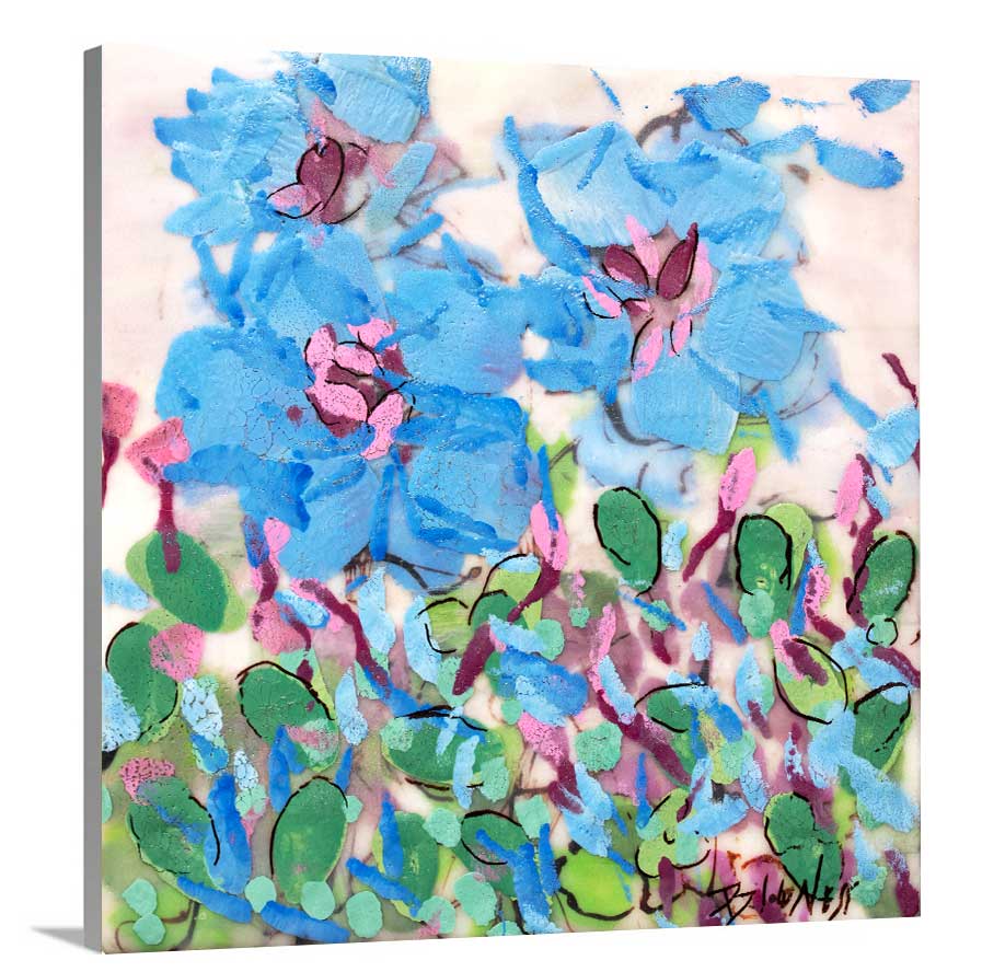 A side-angle view of a blue, pink, green and white abstract floral print on canvas.