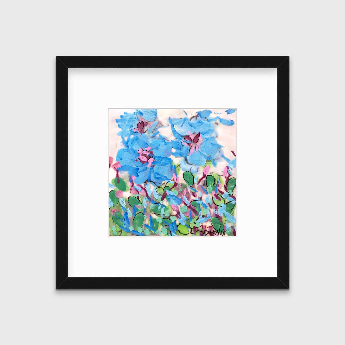 A blue, pink, green and white abstract floral print in a black frame with a mat hangs on a white wall.