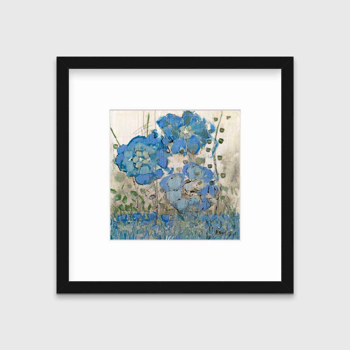 A blue floral print in a black frame with a mat hangs on a white wall.