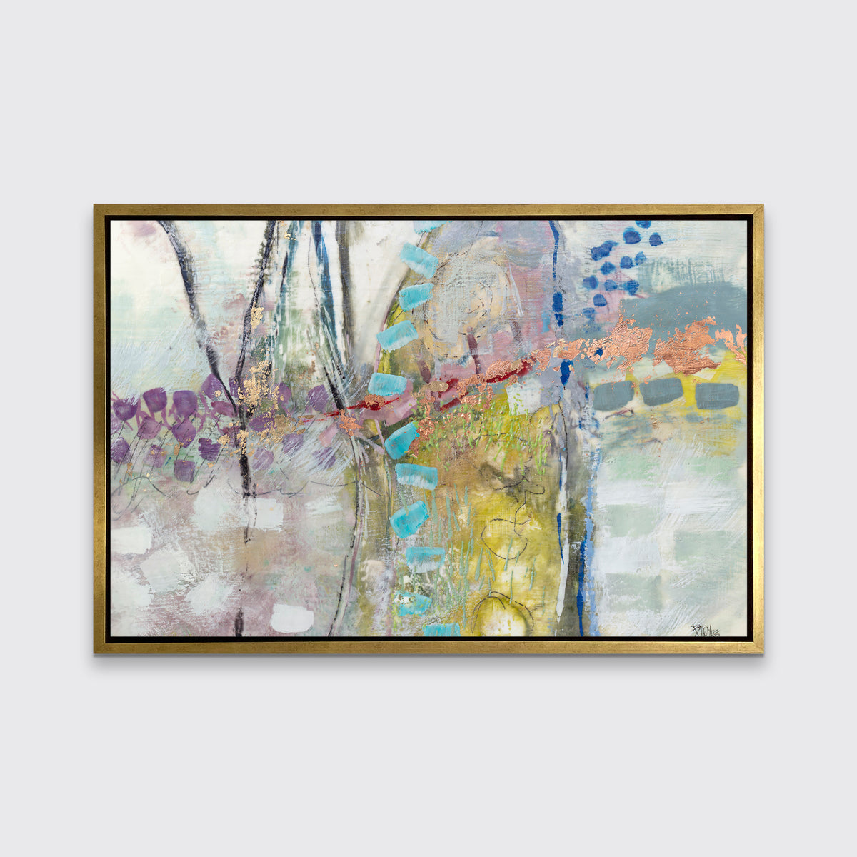 A multicolored abstract print in a gold floater frame hangs on a white wall.
