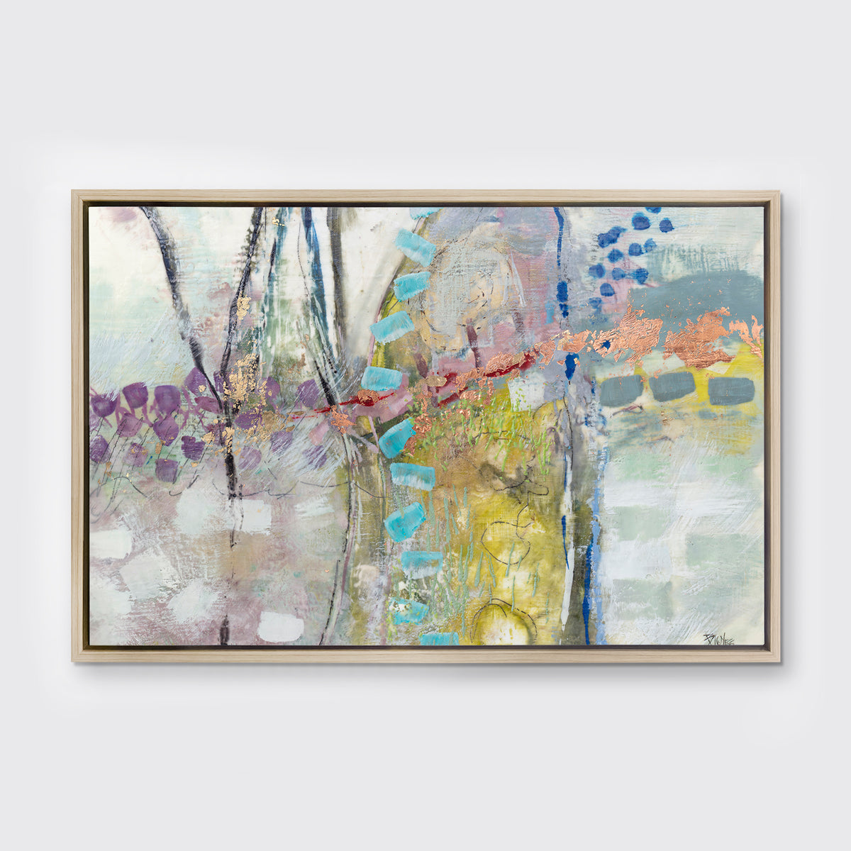 A multicolored abstract print in a white oak wood floater frame hangs on a white wall.