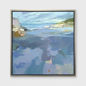 A blue, purple and green abstract landscape print in a silver floater frame hangs on a white wall.