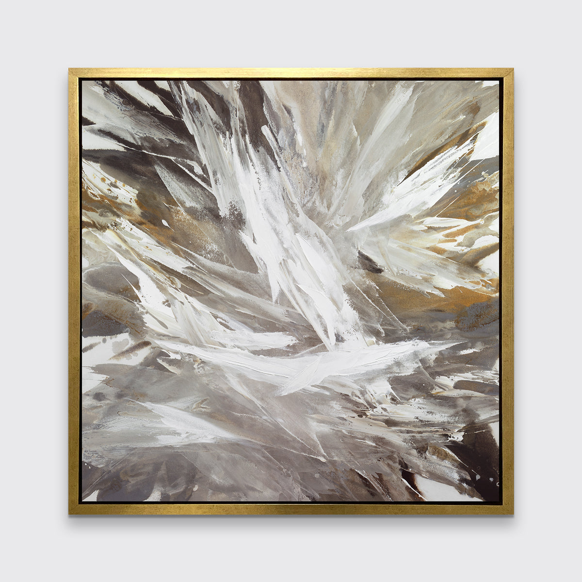 A white, grey, dark grey and gold abstract print in a gold floater frame hangs on a white wall.