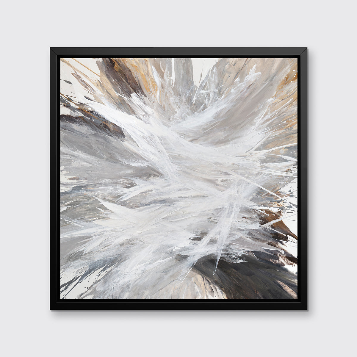 A white, grey, dark grey and gold abstract print in a black floater frame hangs on a white wall.