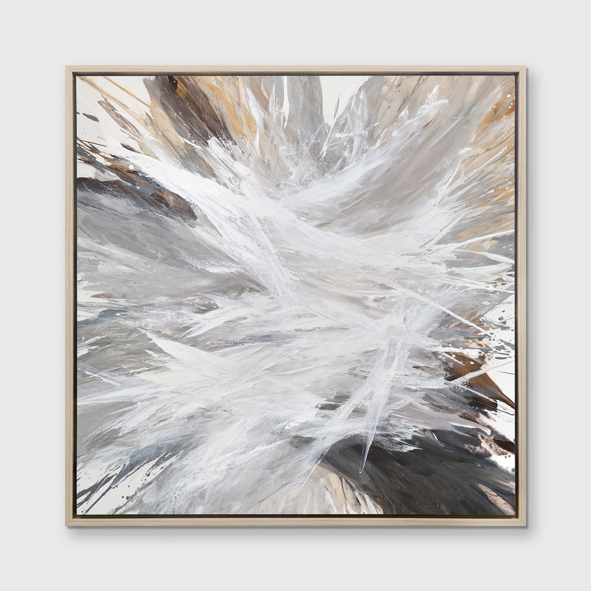 A white, grey, dark grey and gold abstract print in a white oak wood floater frame hangs on a white wall.