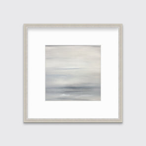A tonal grey abstract print in a silver frame with a mat hangs on a white wall.