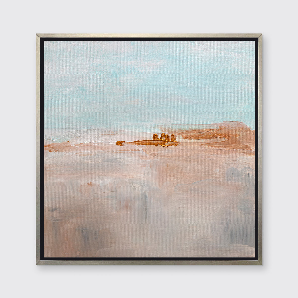 A teal, copper and dusty pink abstract print in a silver floater frame hangs on a white wall.