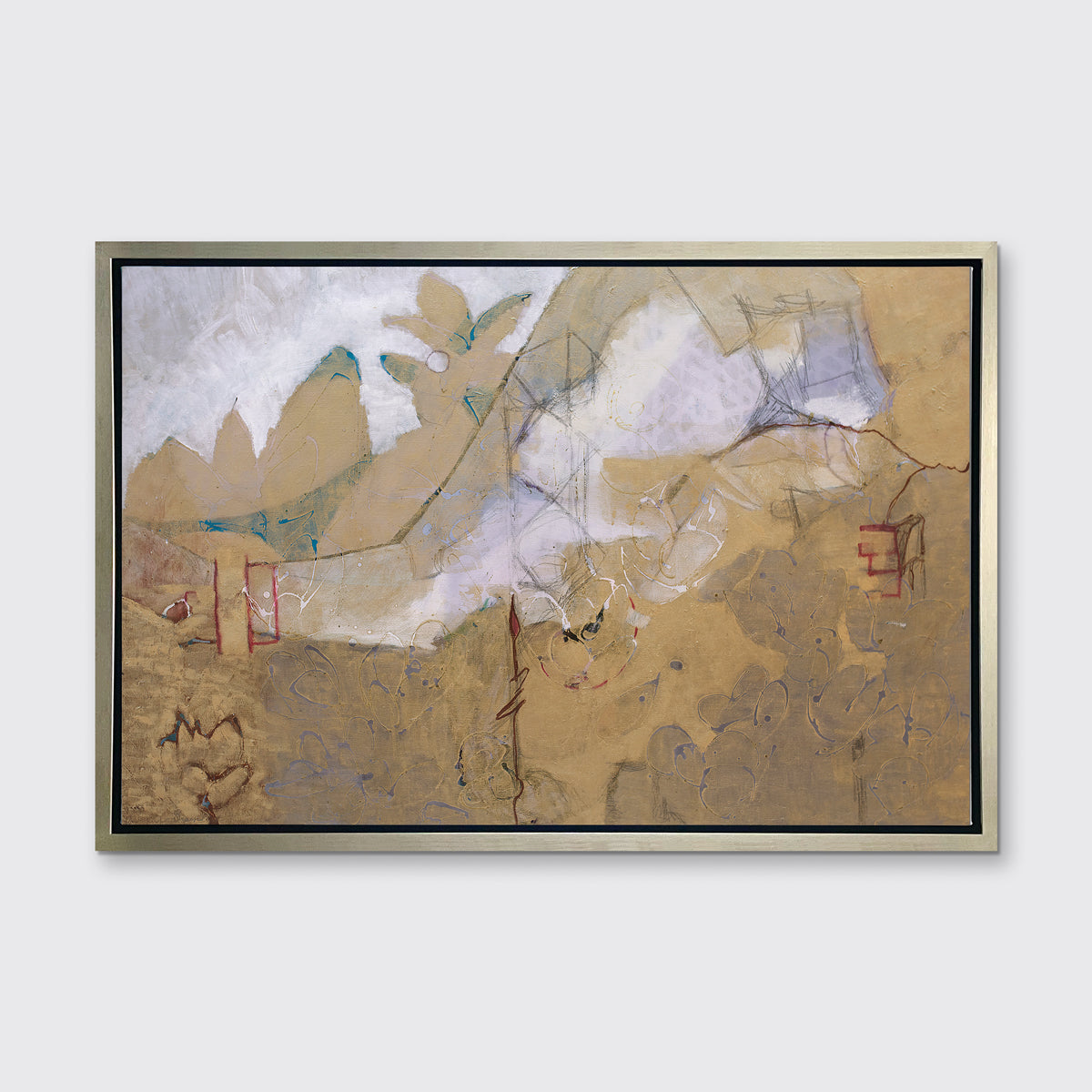 A dark gold, grey and red abstract print in a silver floater frame hangs on a white wall.