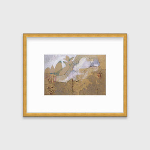 A dark gold and grey abstract print in a gold frame with a mat hangs on a white wall.
