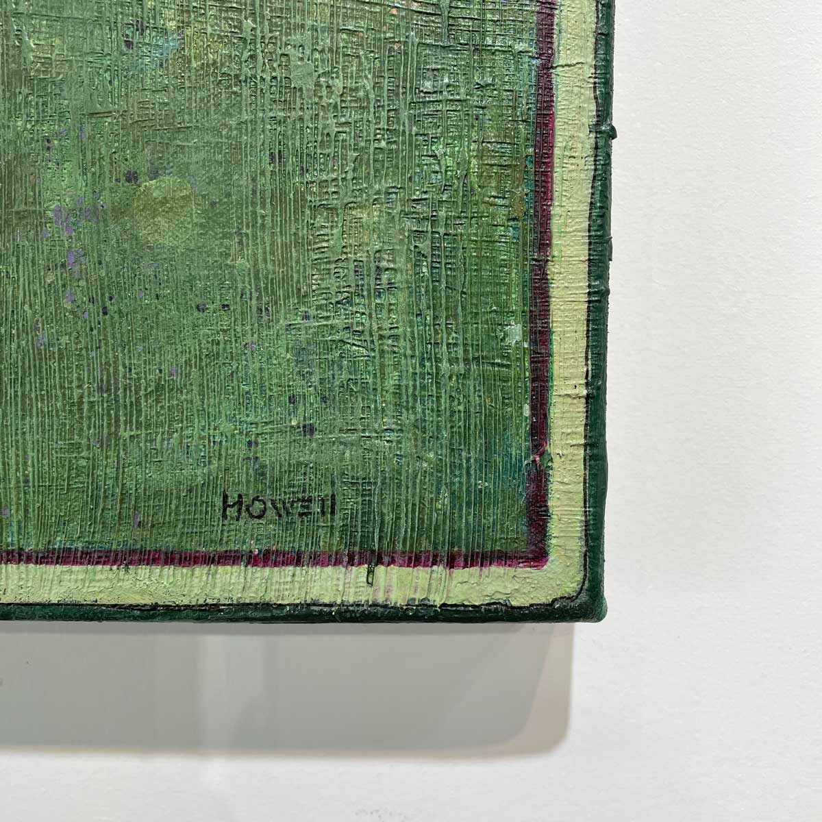 A close up of the artist's signature in the right-hand bottom corner of the painting.