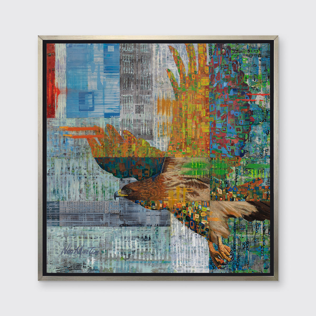 A multicolored abstract print of a flying eagle in a silver floater frame hangs on a white wall.