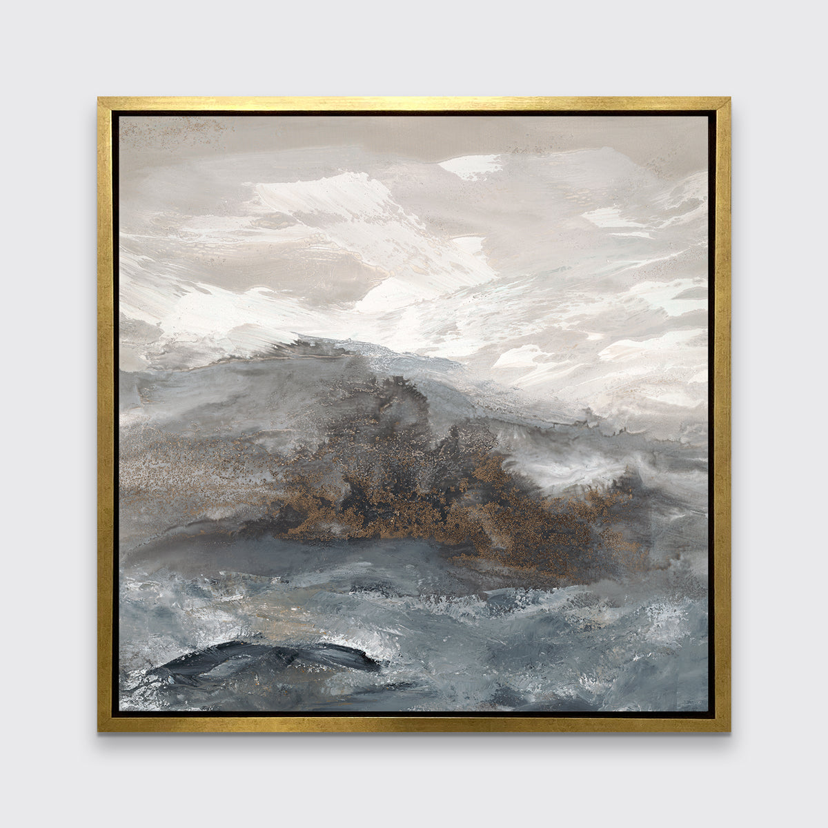 A beige, white, brown and grey abstract print in a gold floater frame hangs on a white wall.