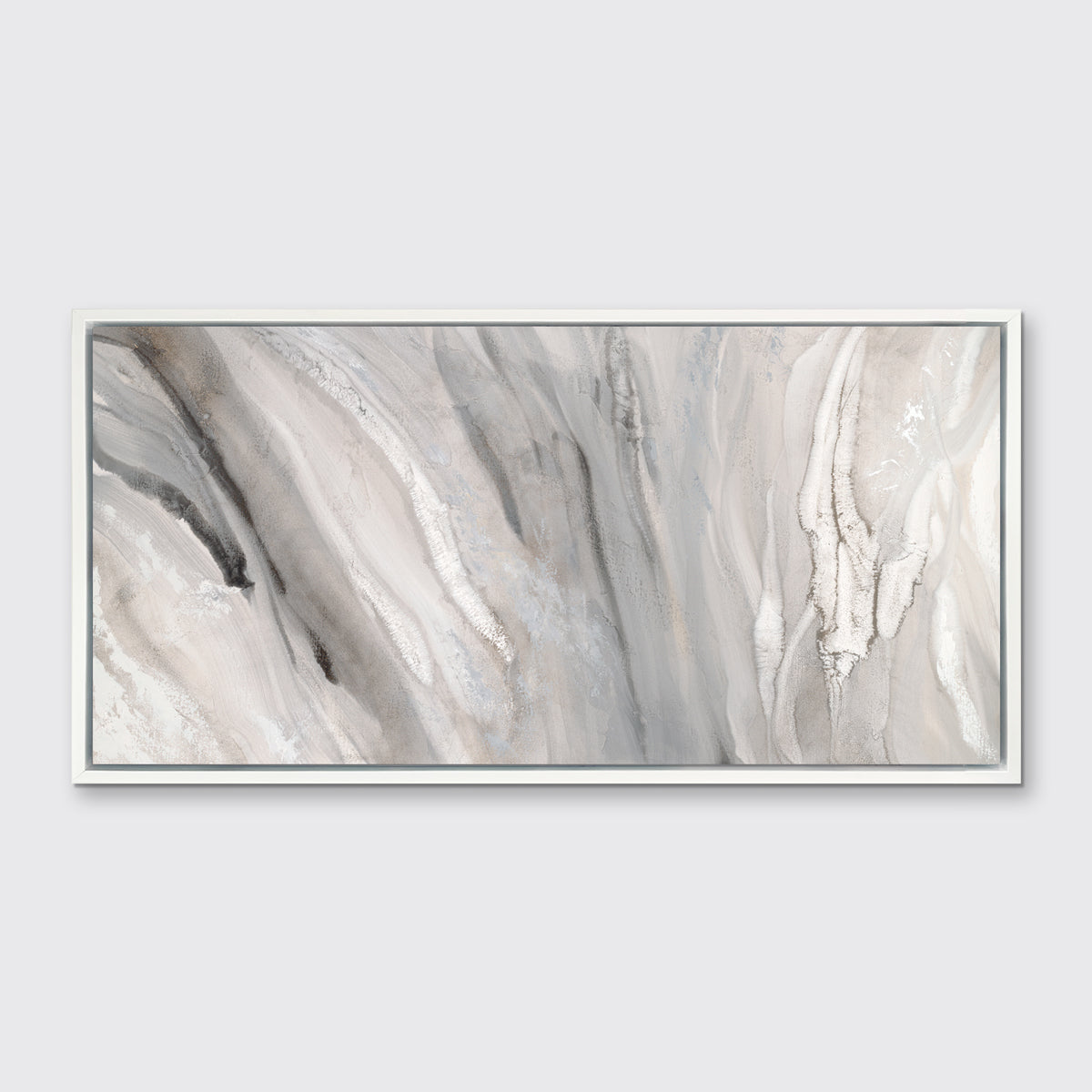 A beige, white and gold abstract print in a white floater frame hangs on a white wall.