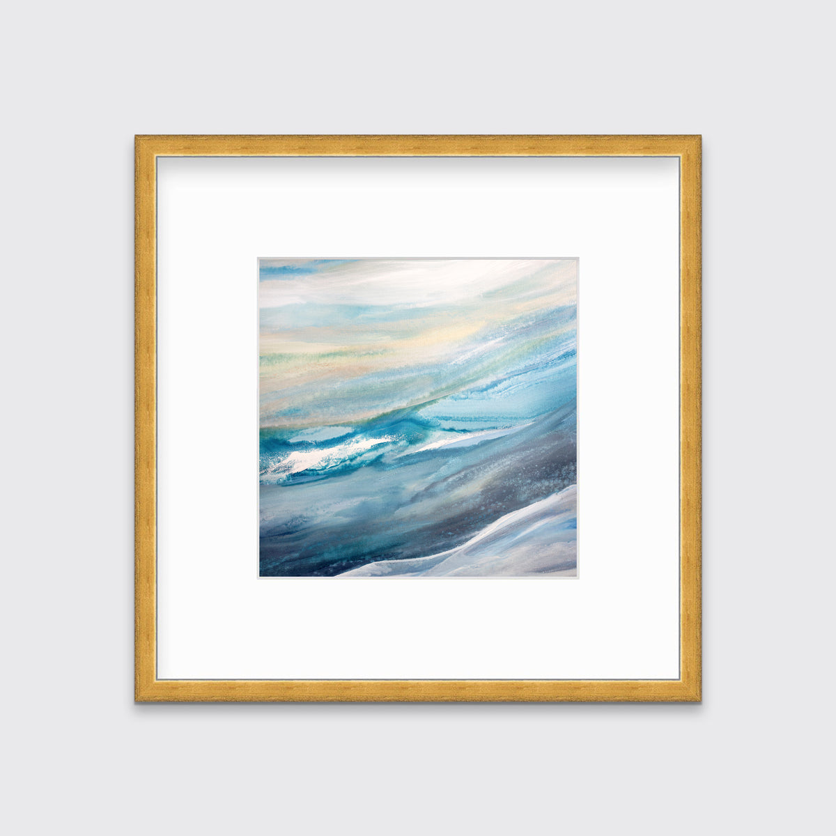 A blue, teal, yellow and white abstract print in a gold frame with a mat hangs on a white wall.