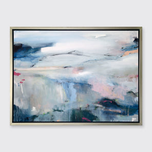 A blue, pink and white abstract print in a silver floater frame hangs on a white wall.