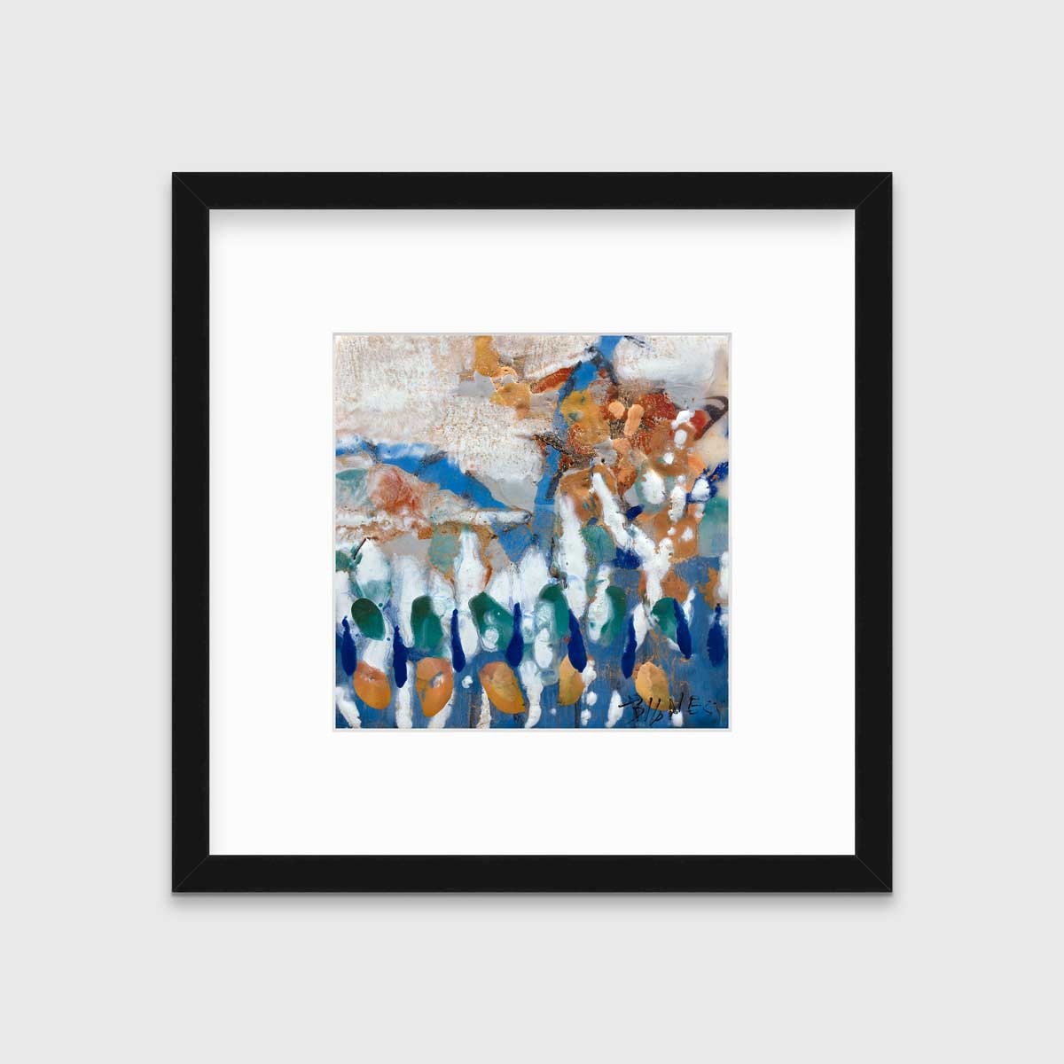 A multicolored abstract print in a black frame with a mat hangs on a white wall.