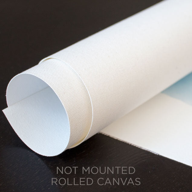 A close up of a rolled canvas.